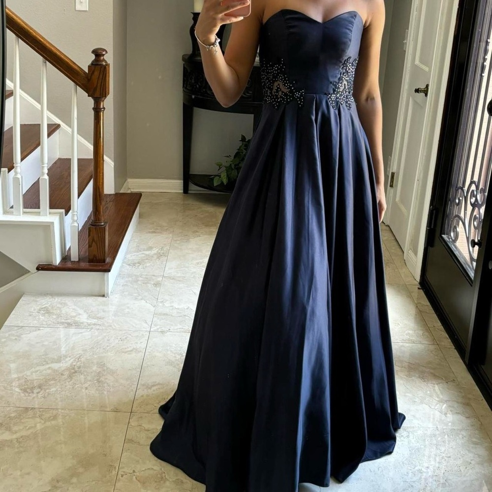 navy blue floor length gown with side mesh detailing